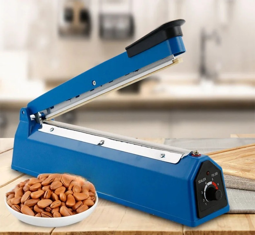 Machine de scellage manuelle à - Food Storage Machine avis et prix